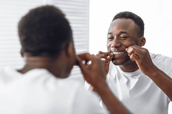 General Dentistry: The Do’s and Don’ts of Flossing from Hermann Park Smiles in Houston, TX